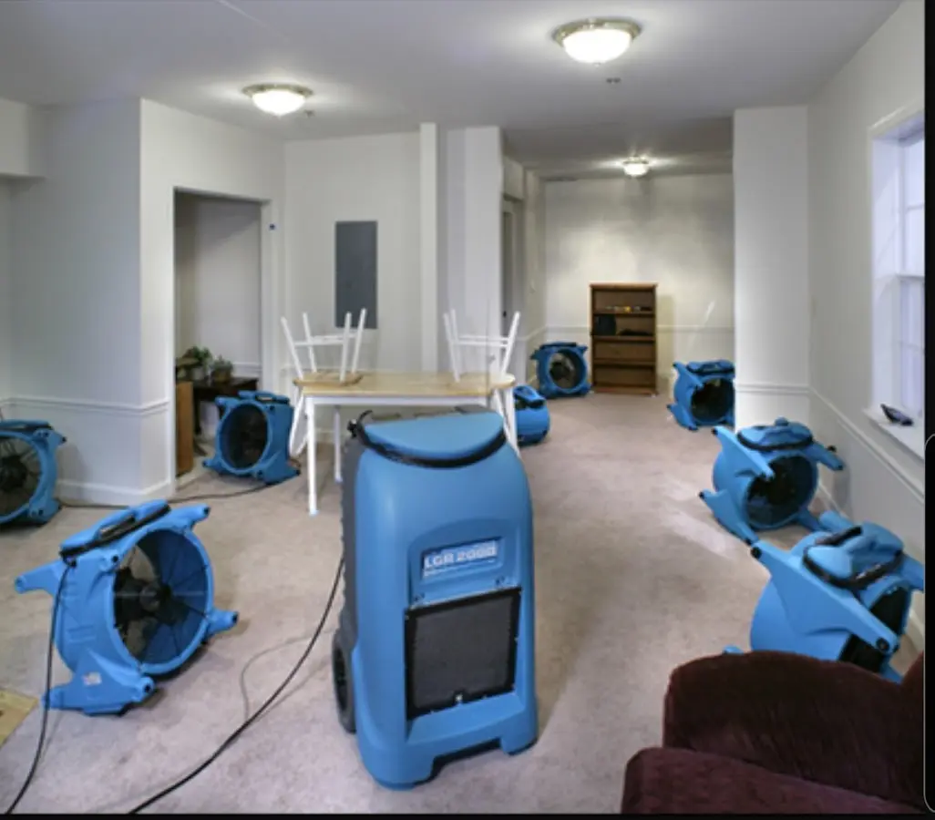 Air movers and dehumidifier setup for Water Damage Restoration in Parma